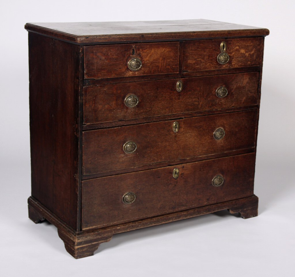 An early 19th century oak chest