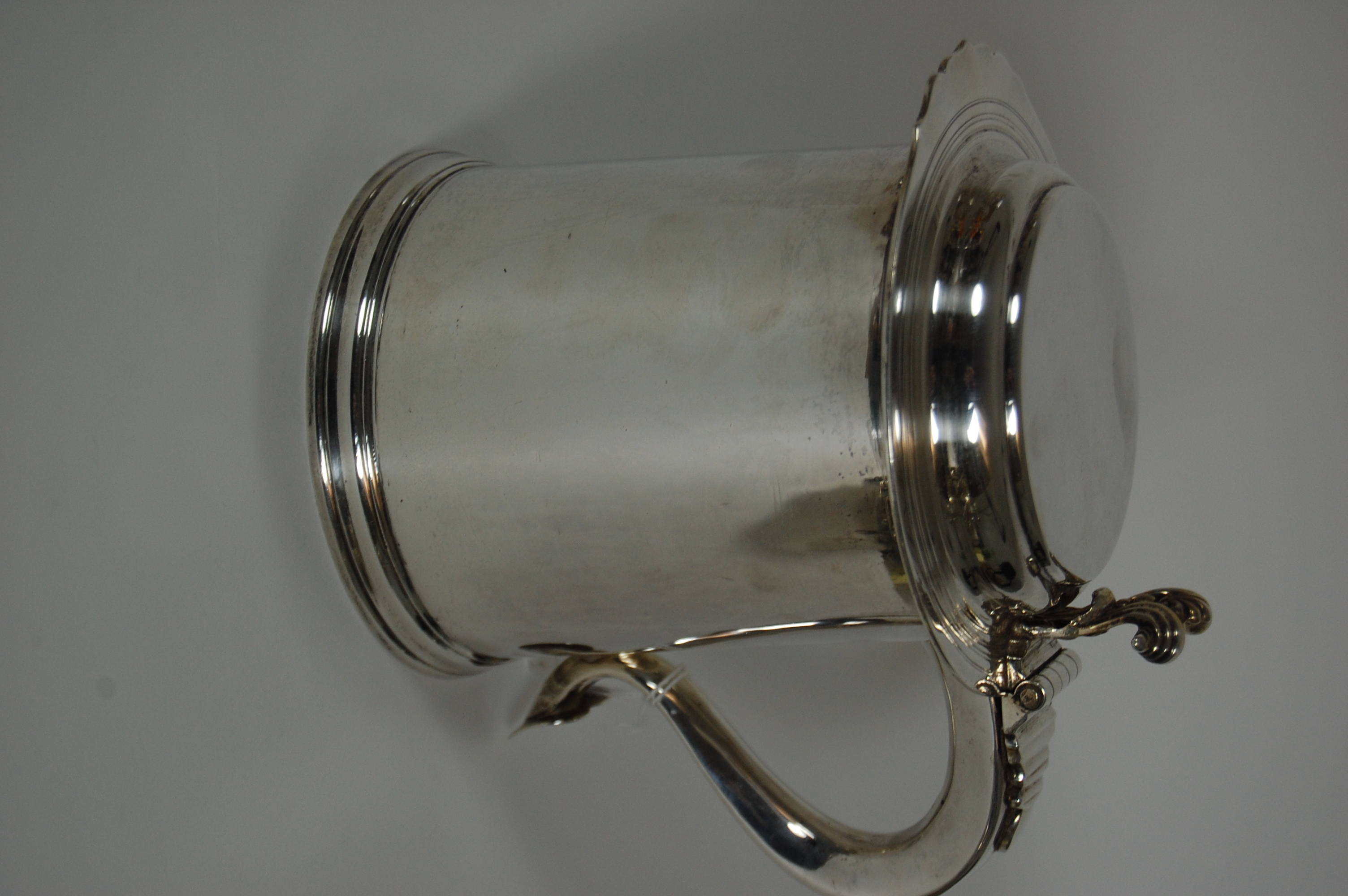 A William and Mary style lidded tankard