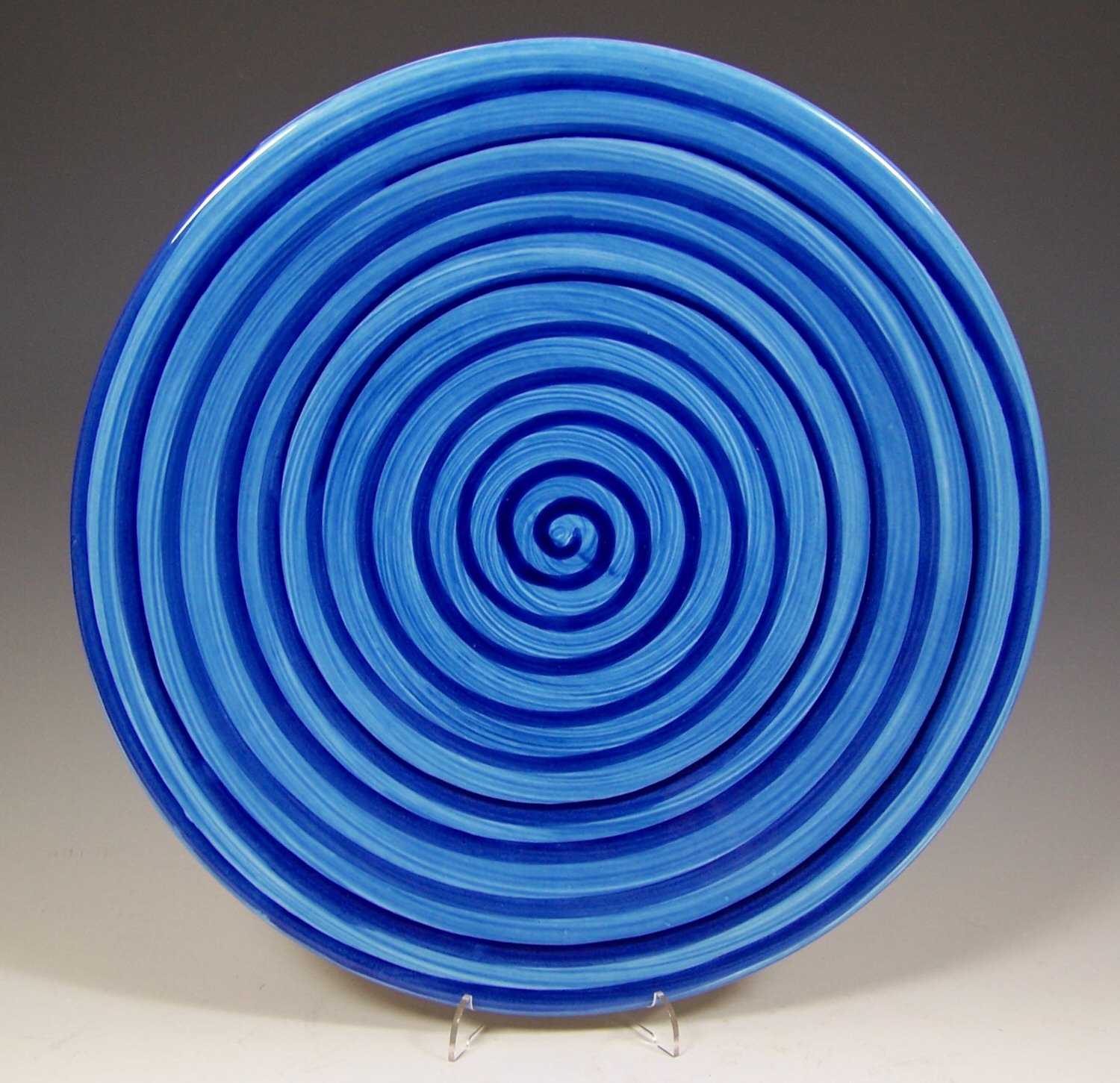 A Poole Pottery limited edition charger by Terry Frost