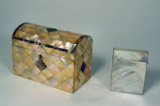 A mother of pearl cube parquetry stationery box