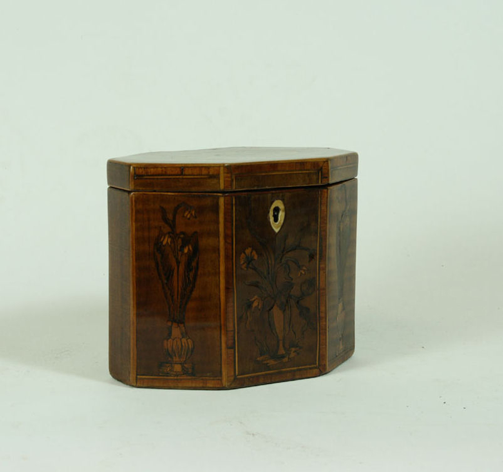 A George III mahogany octagonal tea caddy
