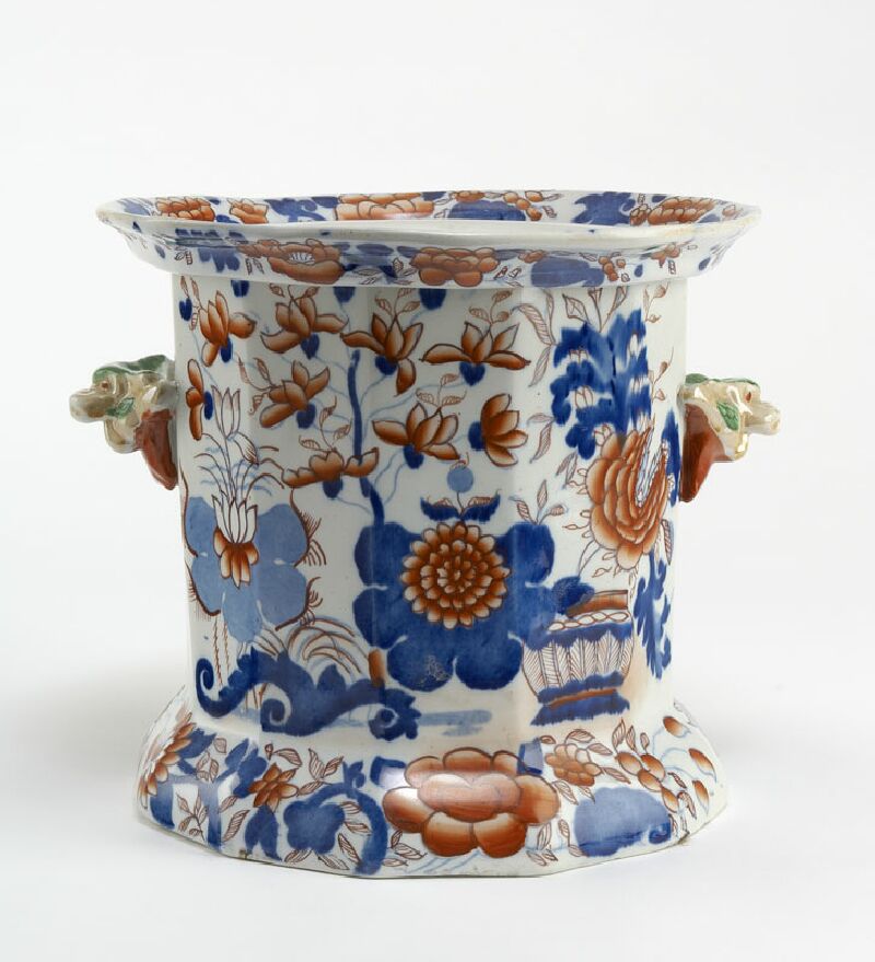 An early 19th century ironstone fruit cooler and liner
