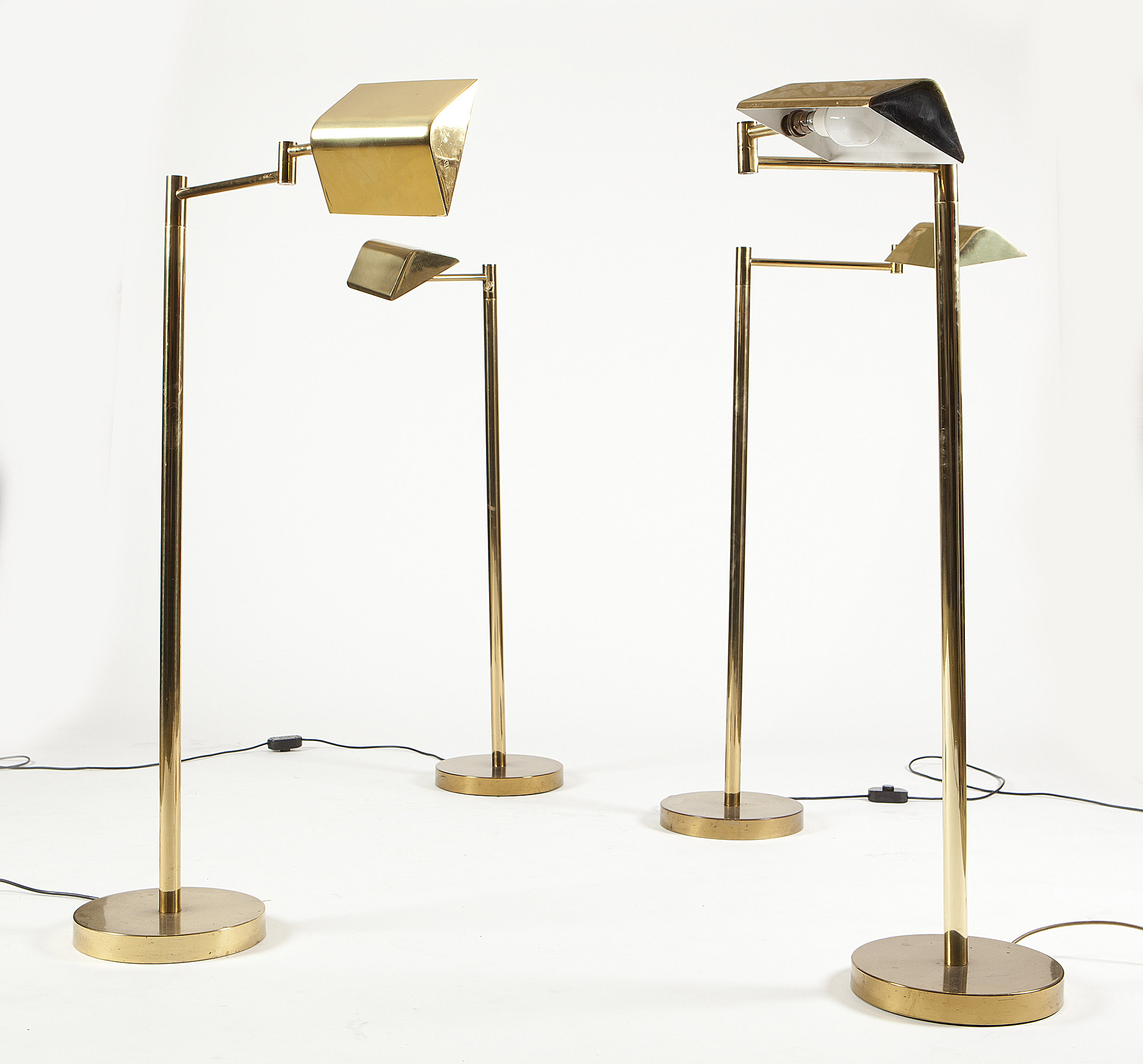 FOUR BRASS ADJUSTABLE FLOOR LAMPS