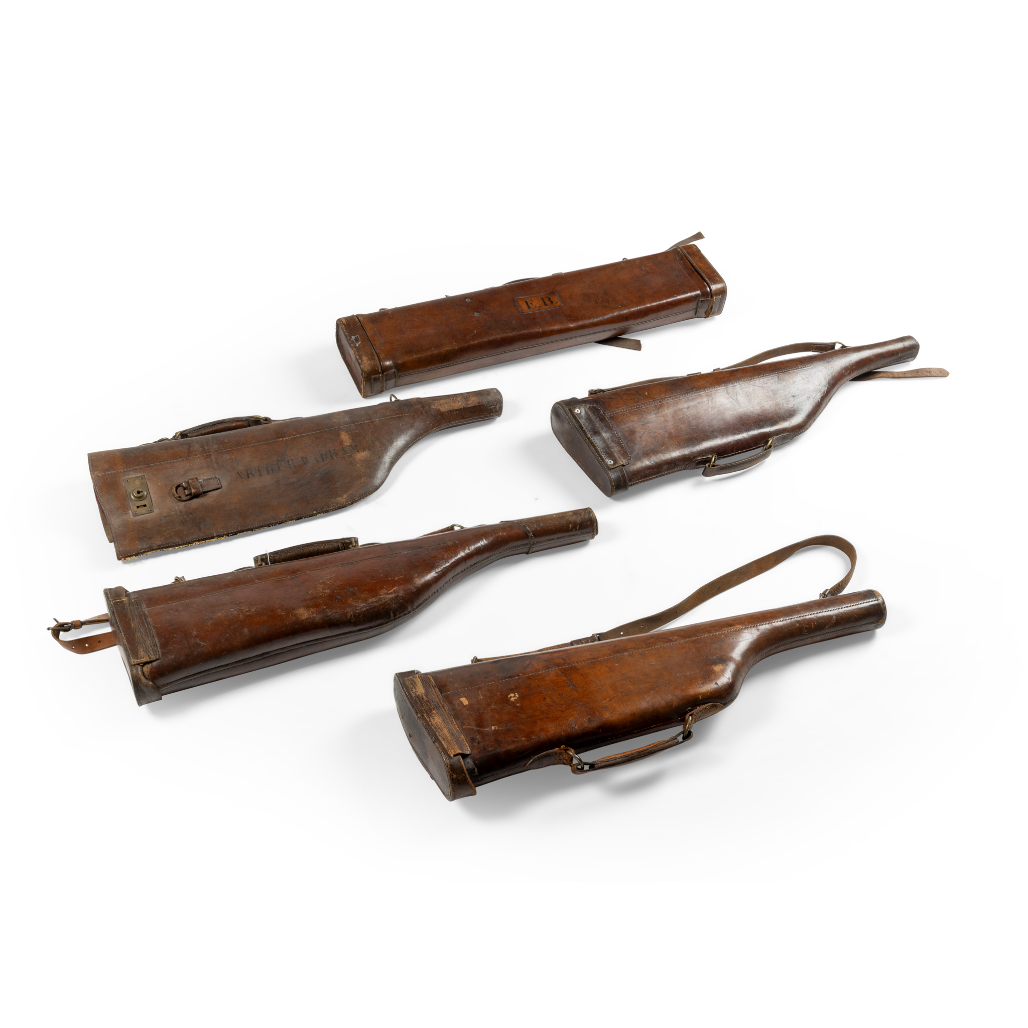 A LEATHER GUN CASE, AND FOUR 'LEG OF MUTTON' GUN CASES