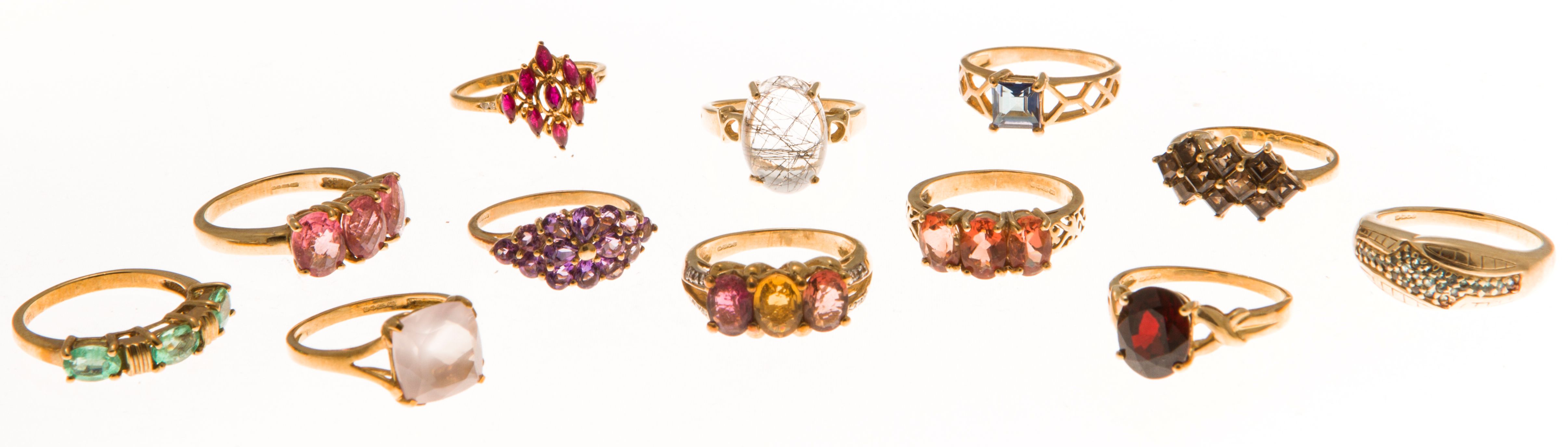 A large collection of 9ct gold gem set rings