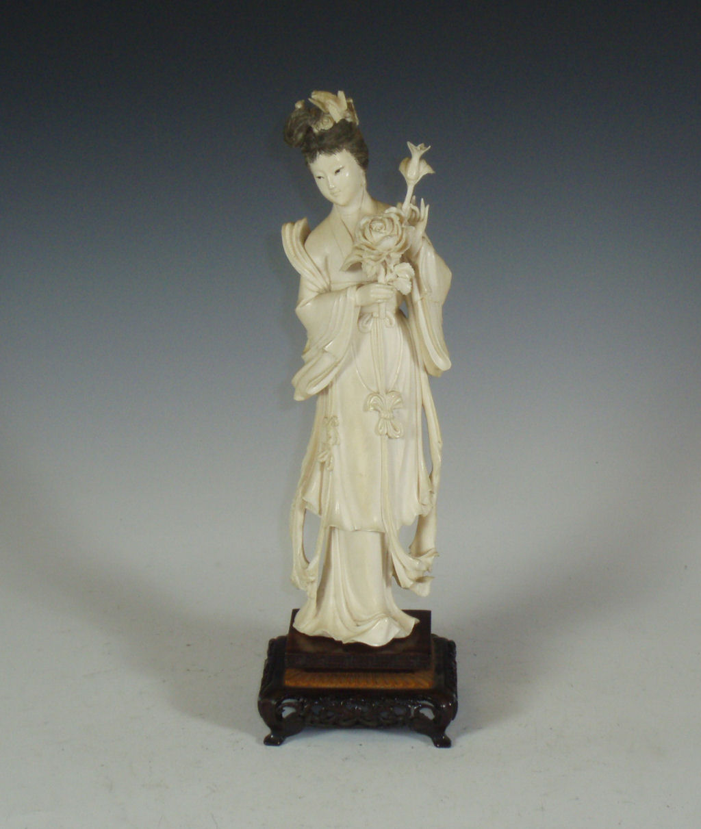 An early 20th century Chinese ivory figure