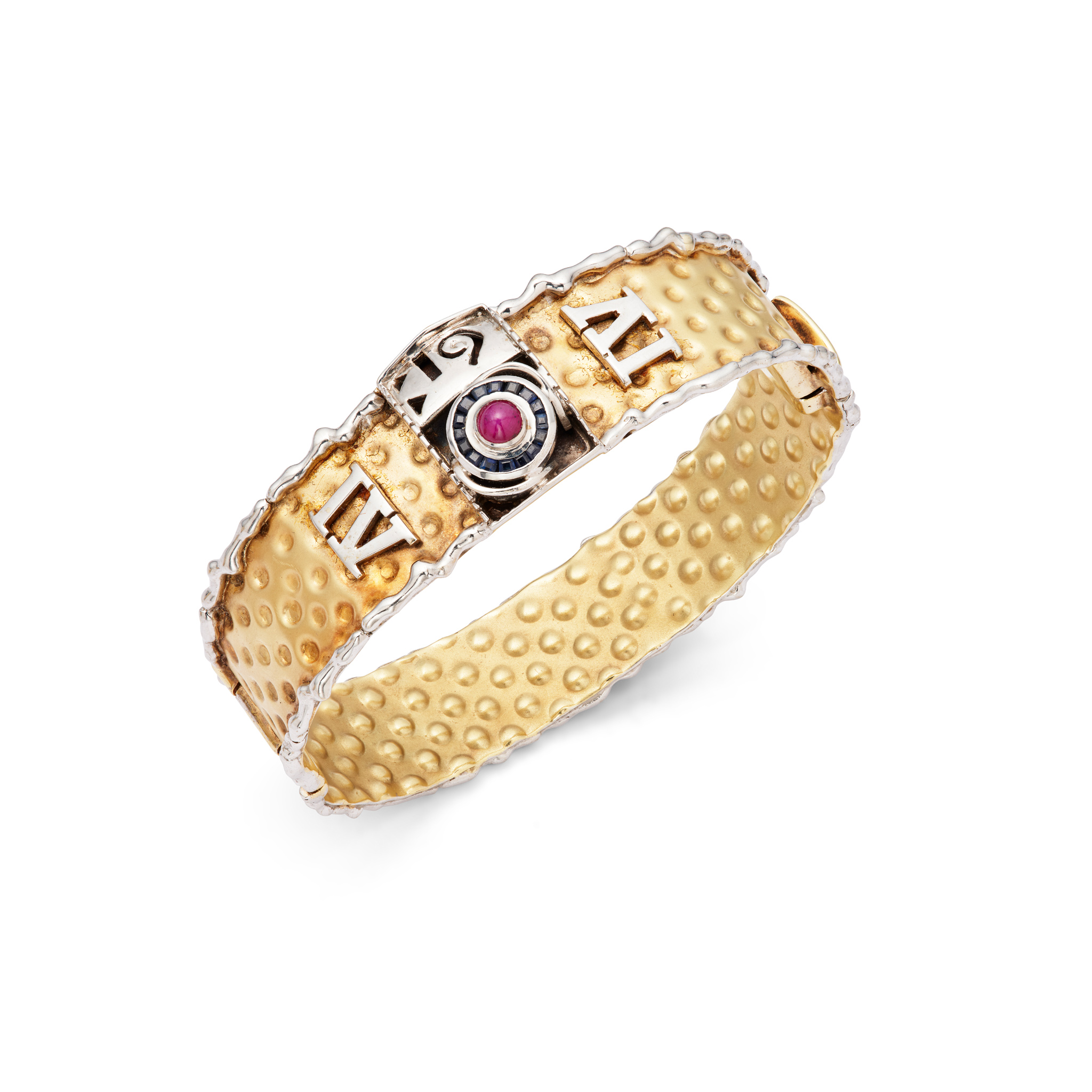 Cetas: A bi-coloured gem-set bangle