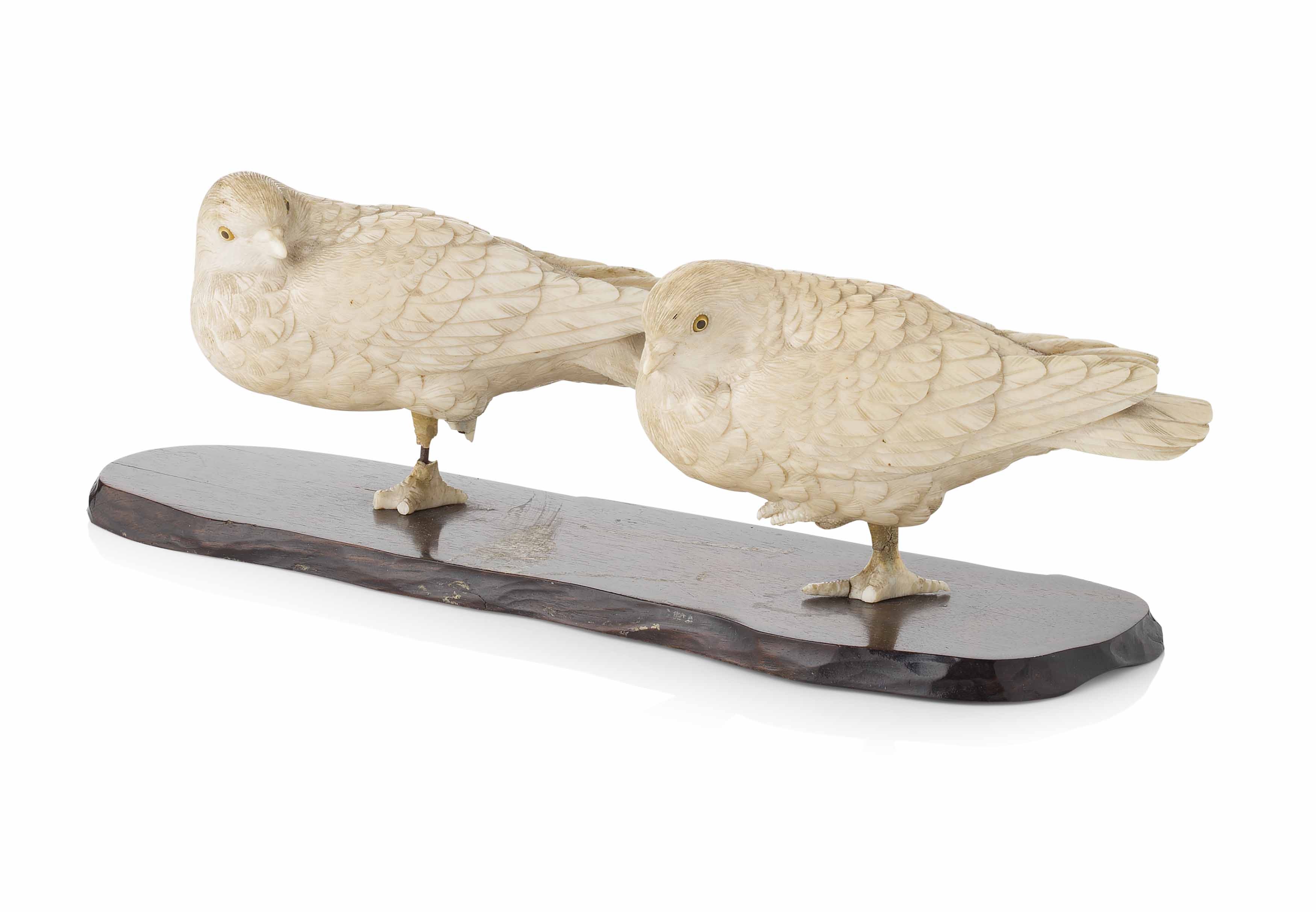 JAPANESE CARVED IVORY OKIMONO OF TWO BIRDS