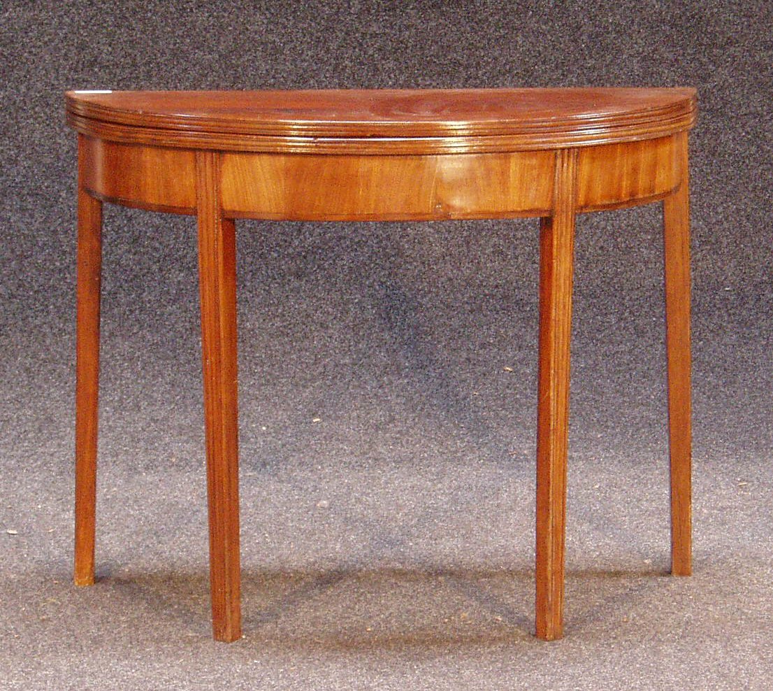 George III mahogany D-shaped foldover tea table,