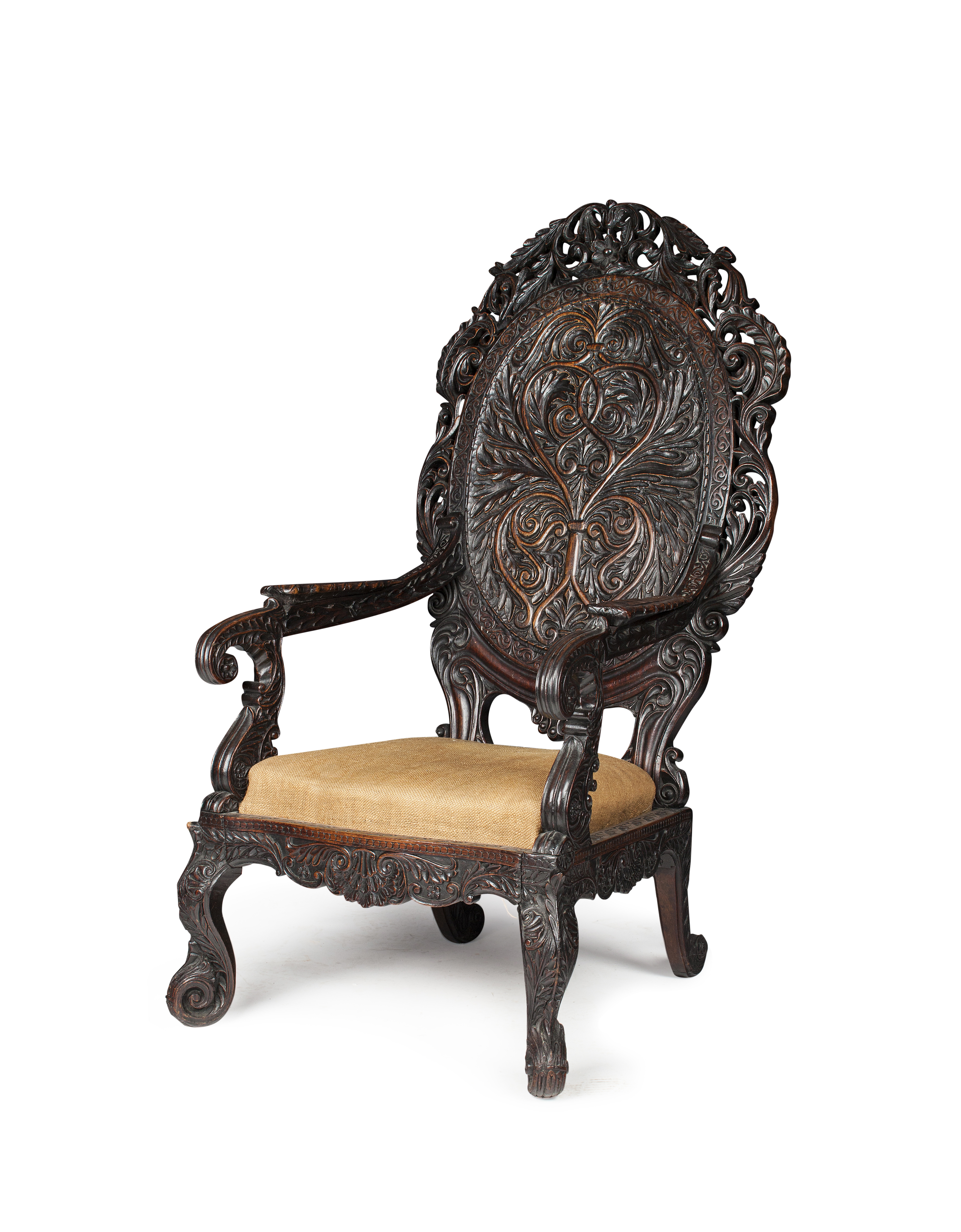 ANGLO-INDIAN CARVED HARDWOOD ARMCHAIR