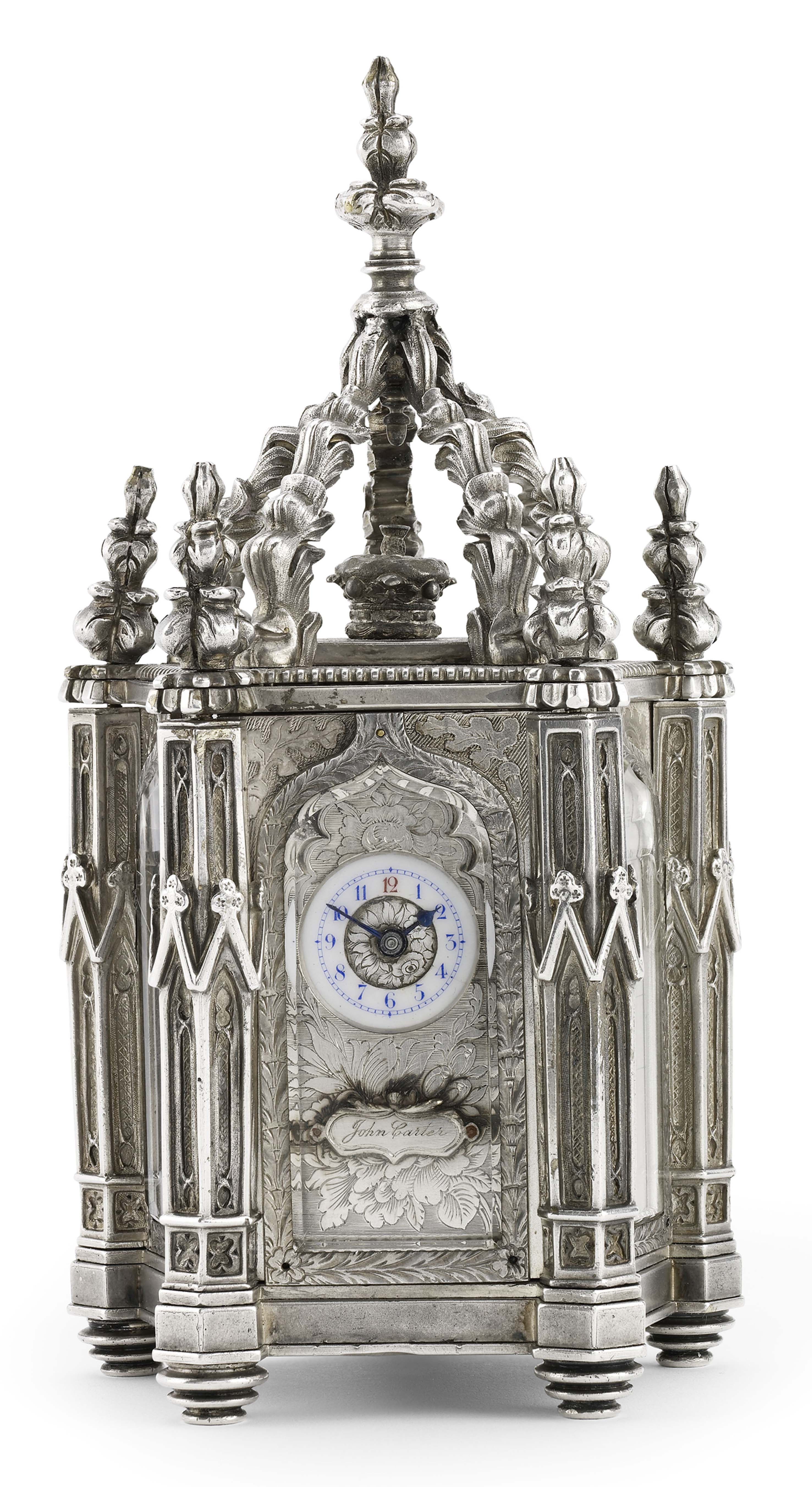 A fine Gothic revival silver-cased desk clock with perpetual calendar and thermometer
