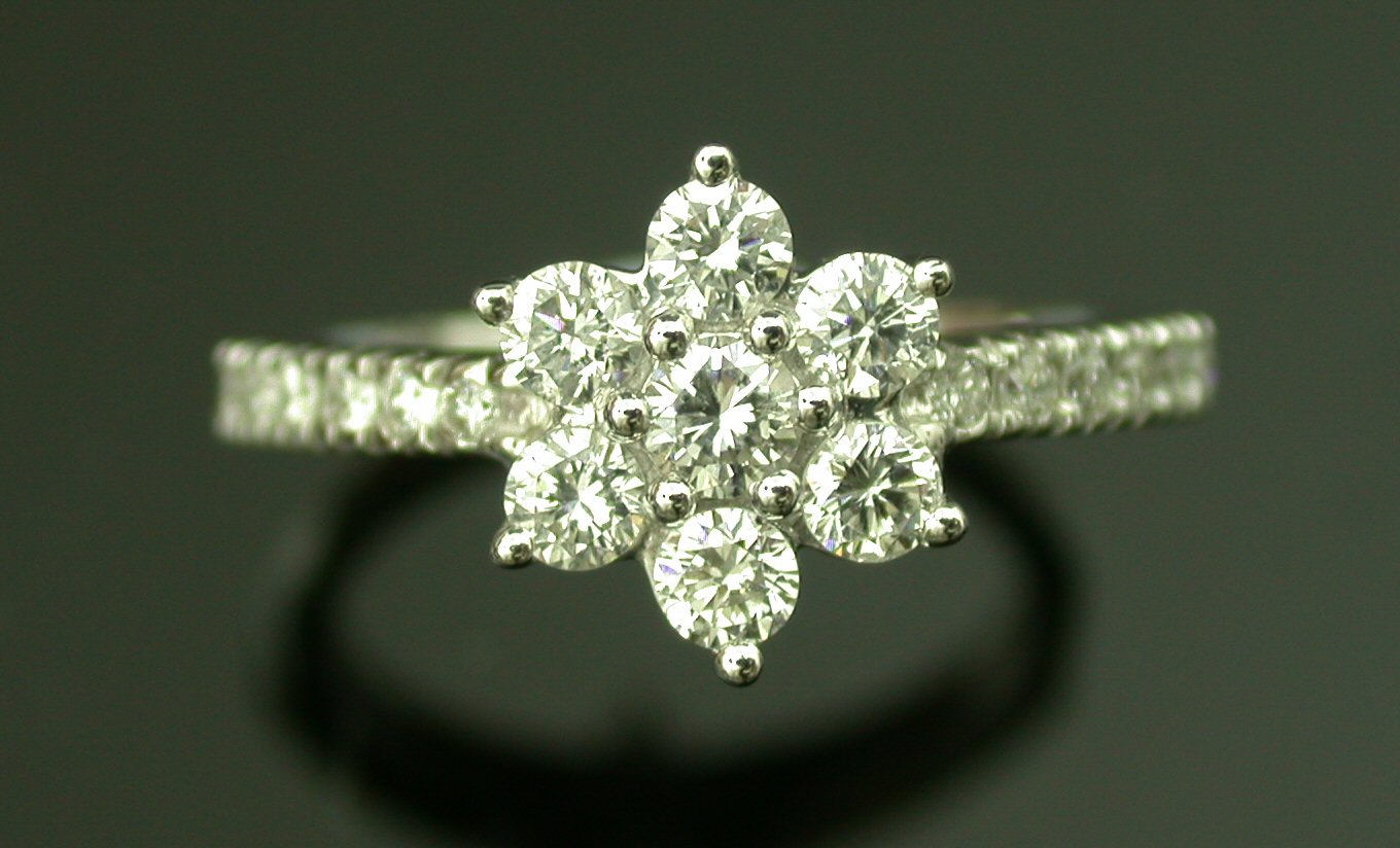 A diamond floral cluster ring,