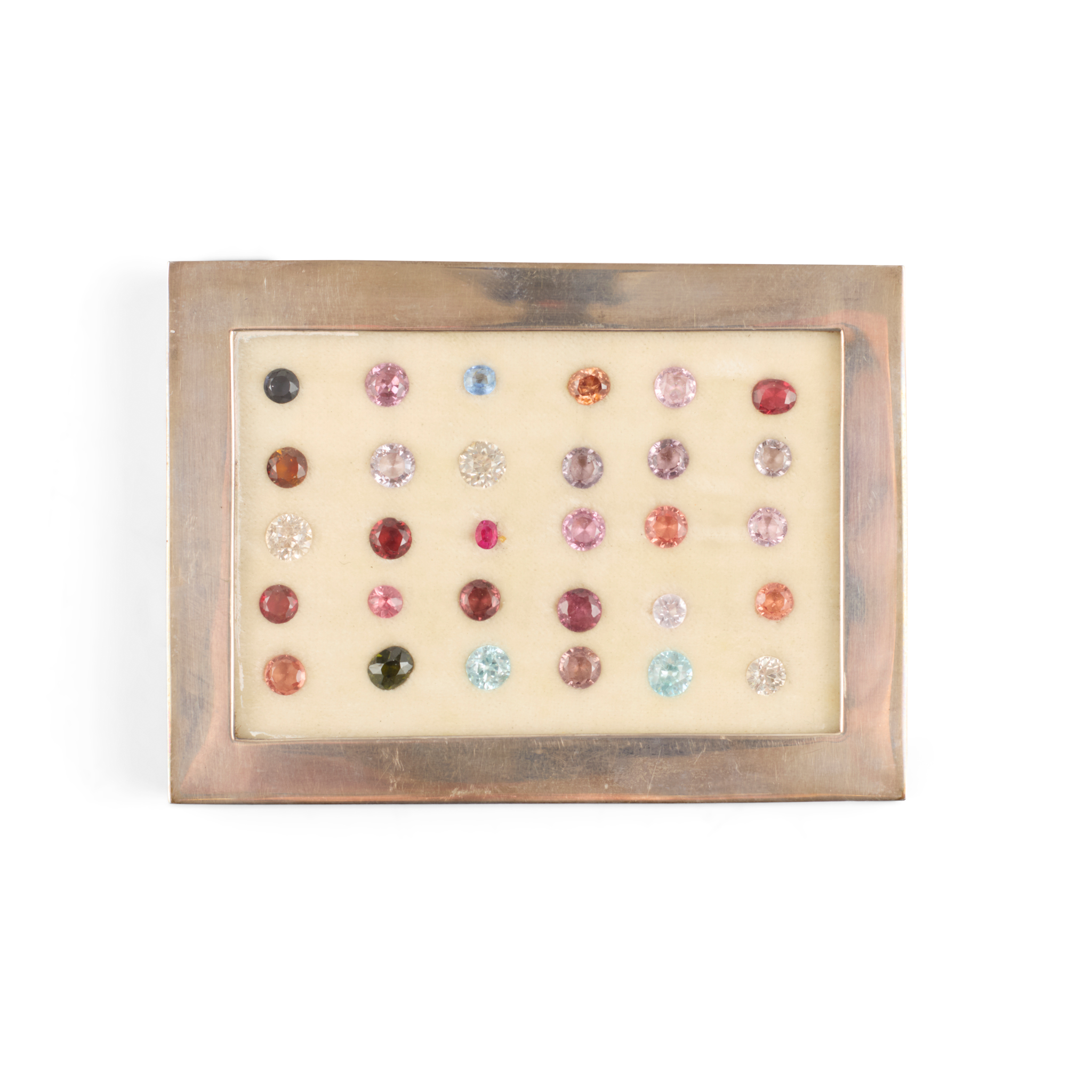 A collection of unmounted gemstones