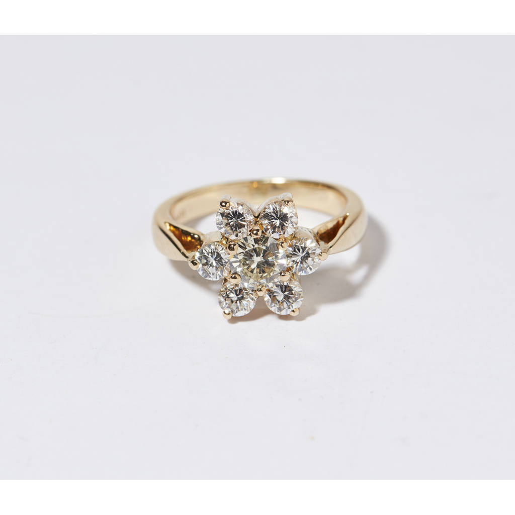 A diamond set cluster ring
