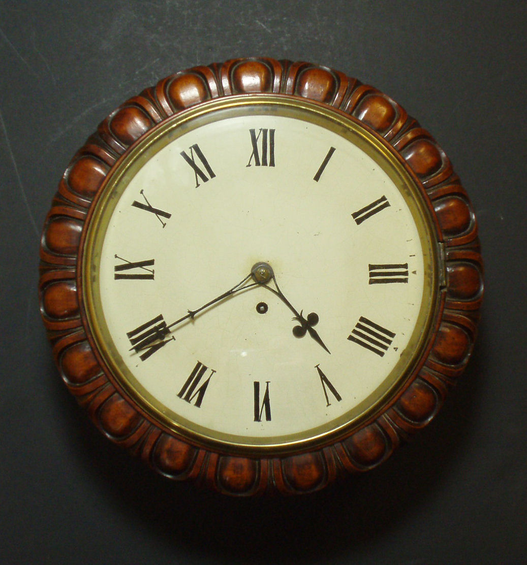 A mahogany Dial clock