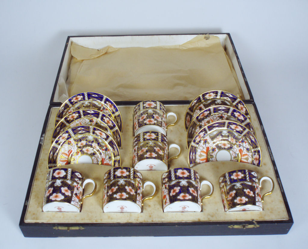 A set of six Royal Crown Derby coffee cups and saucers
