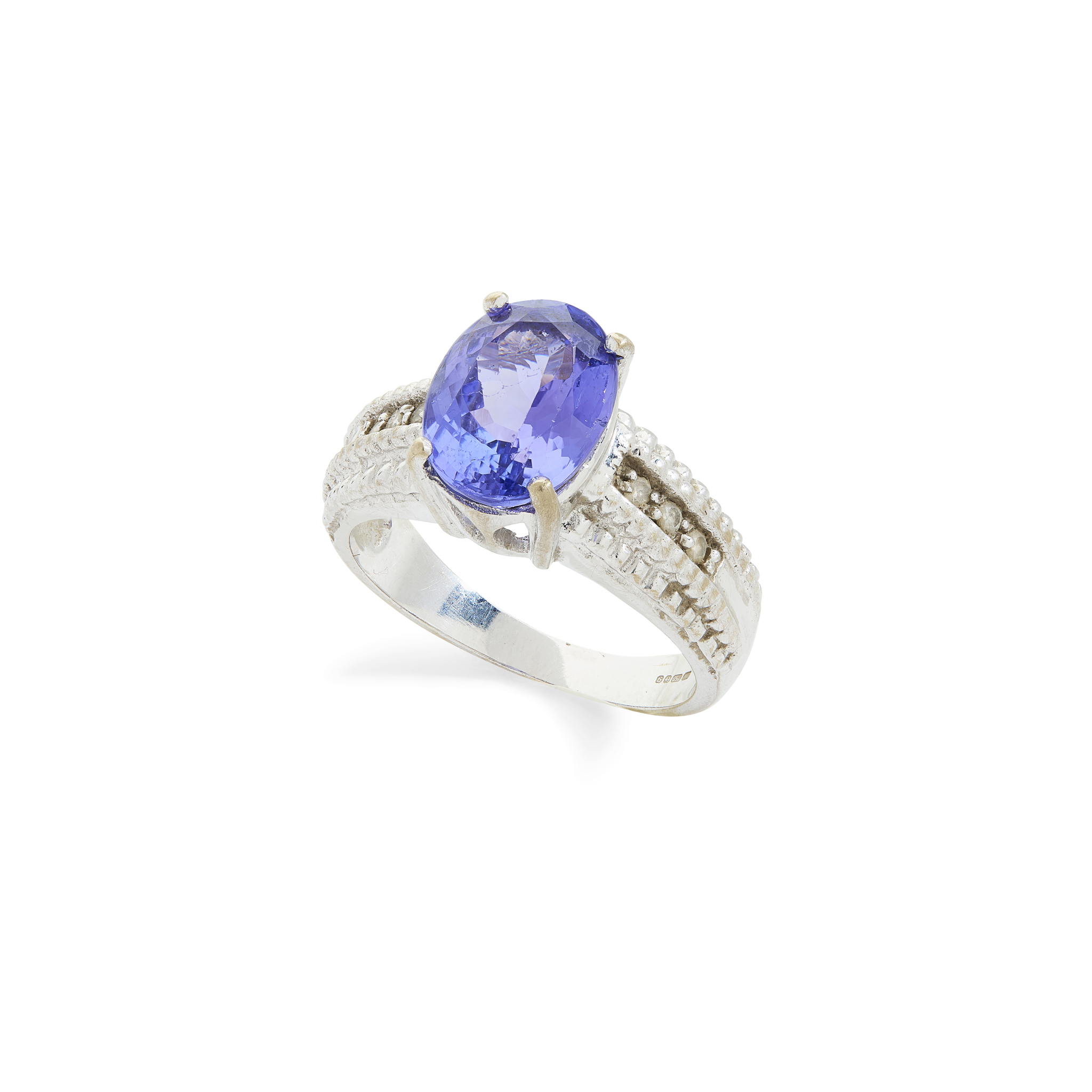 An 18ct gold Tanzanite and diamond cluster ring