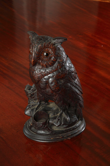 A late 19th/early 20th century Swiss carved wood tobacco box