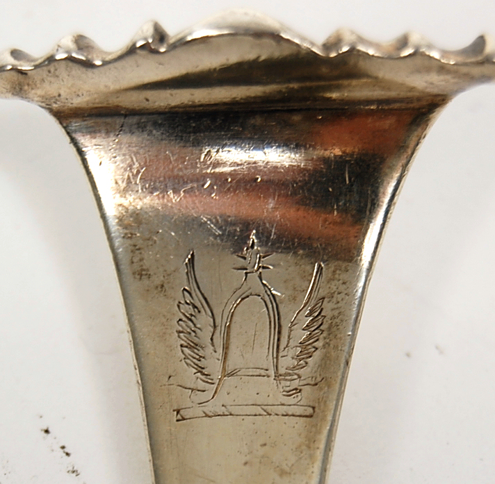 A scarce George III stuffing spoon