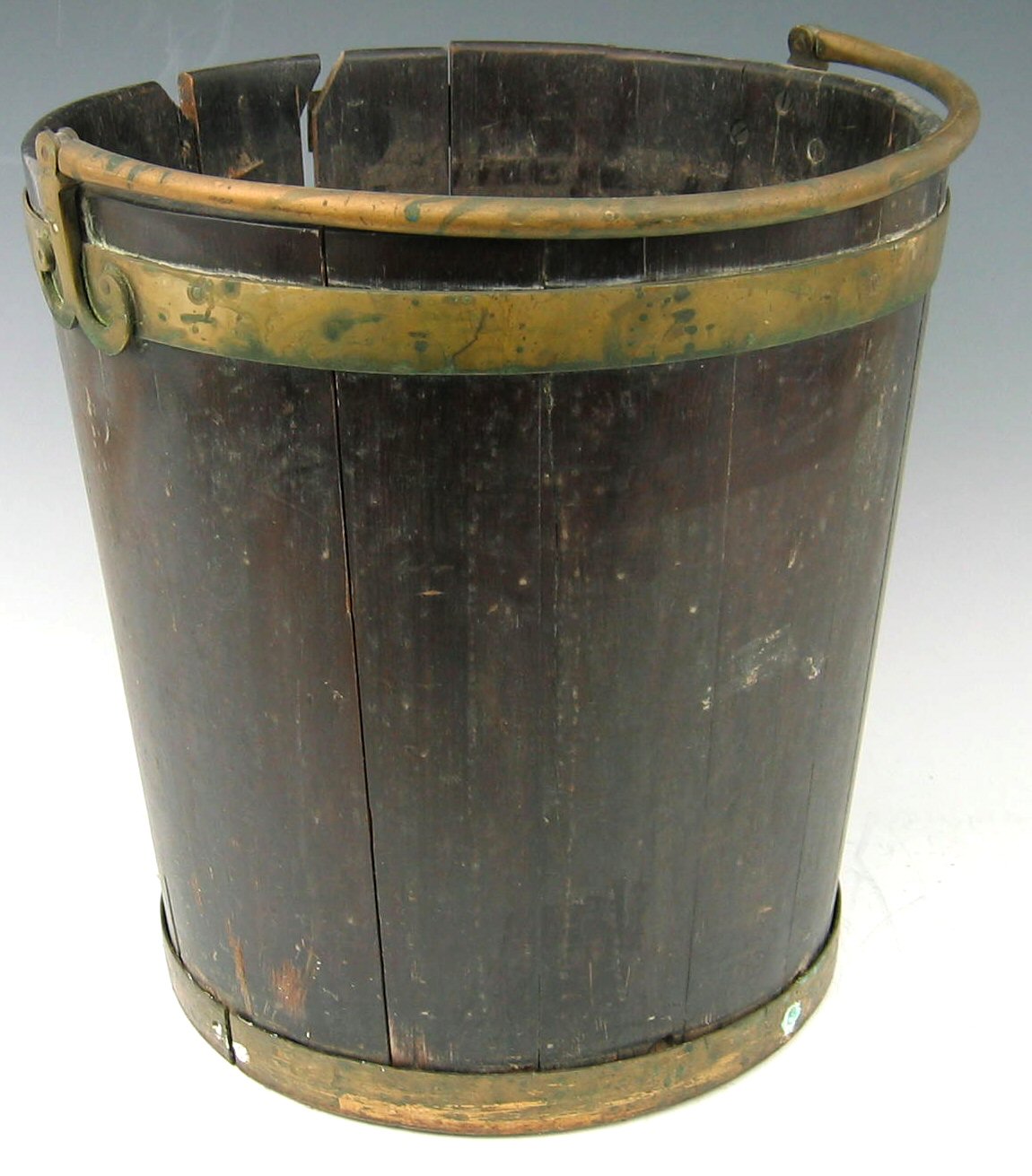 A 19th century staved mahogany and brass bound peat bucket,
