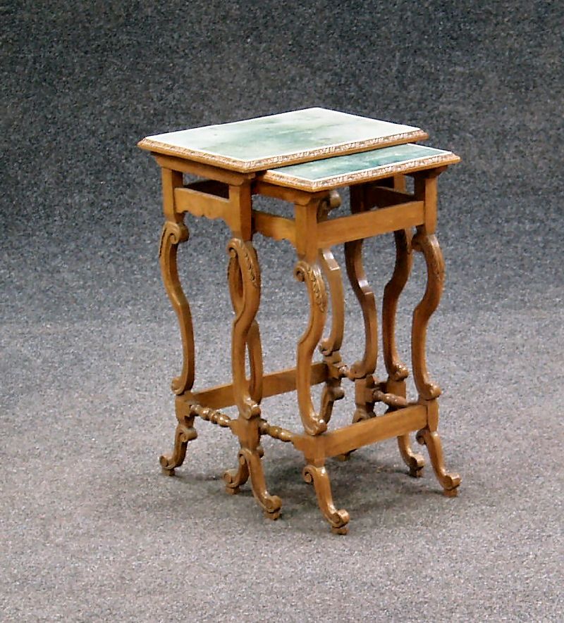 A nest of two oak tables