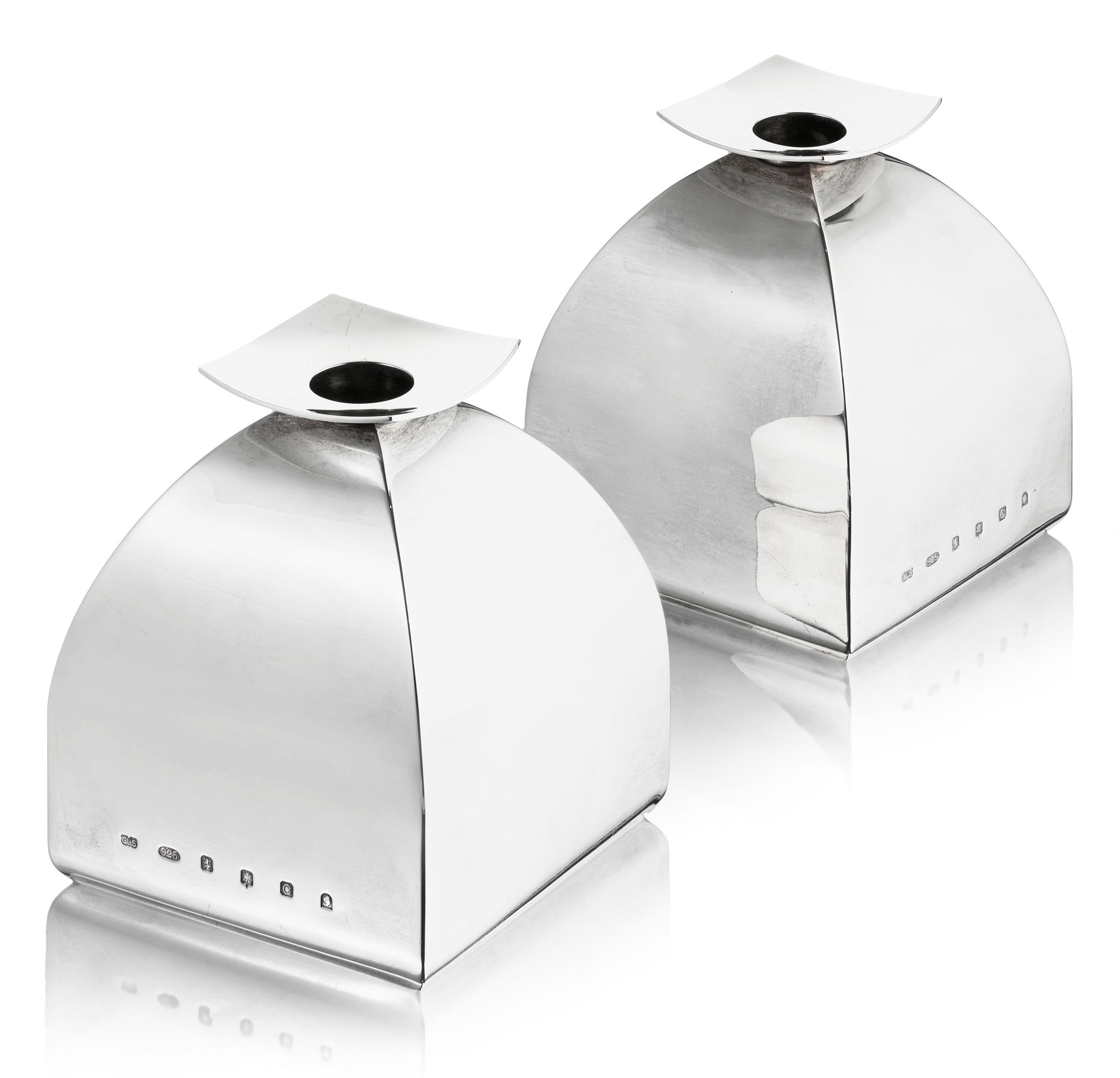 A pair of contemporary silver candlesticks