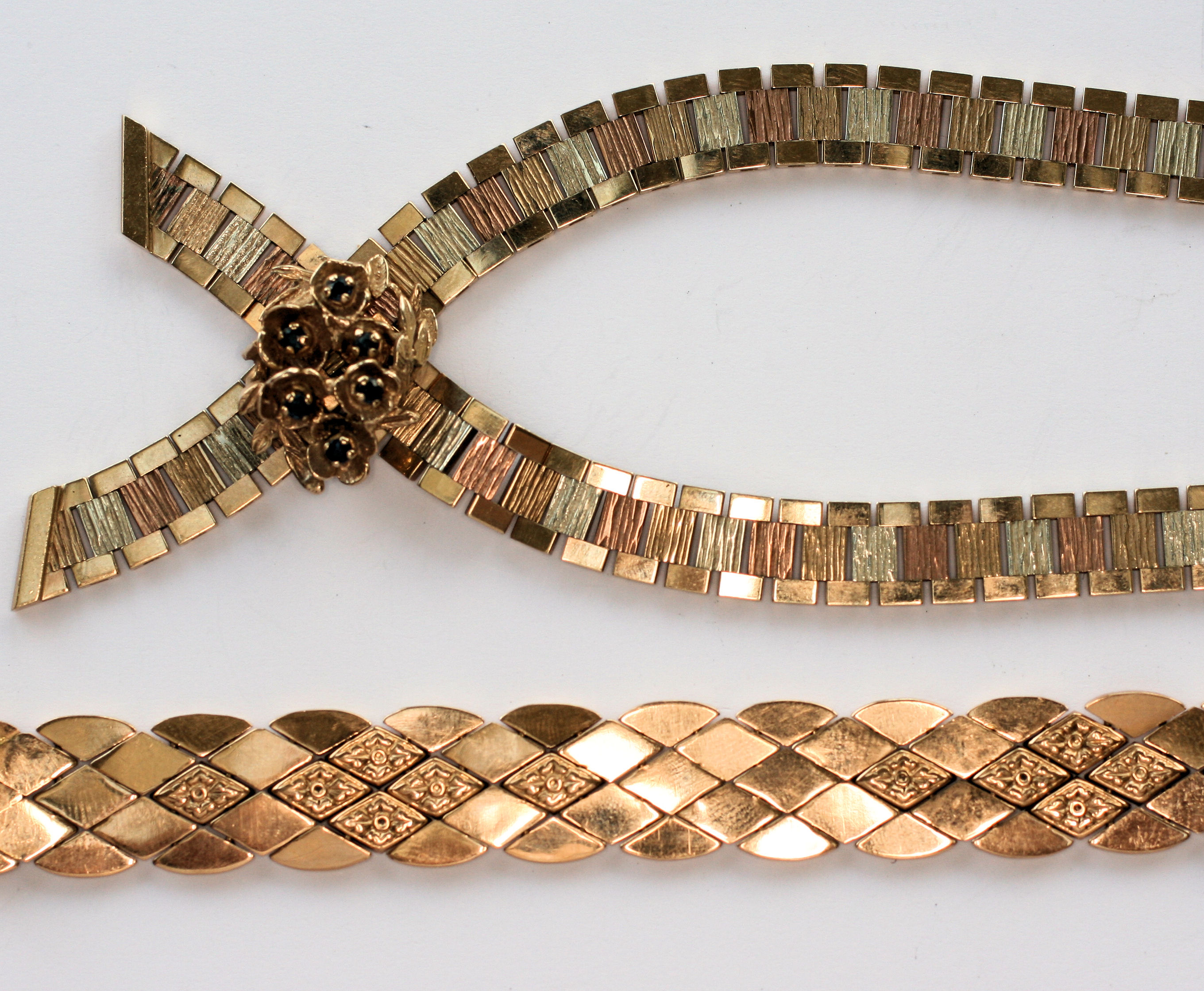 A 1970's two colour gold necklet set cluster sapphires