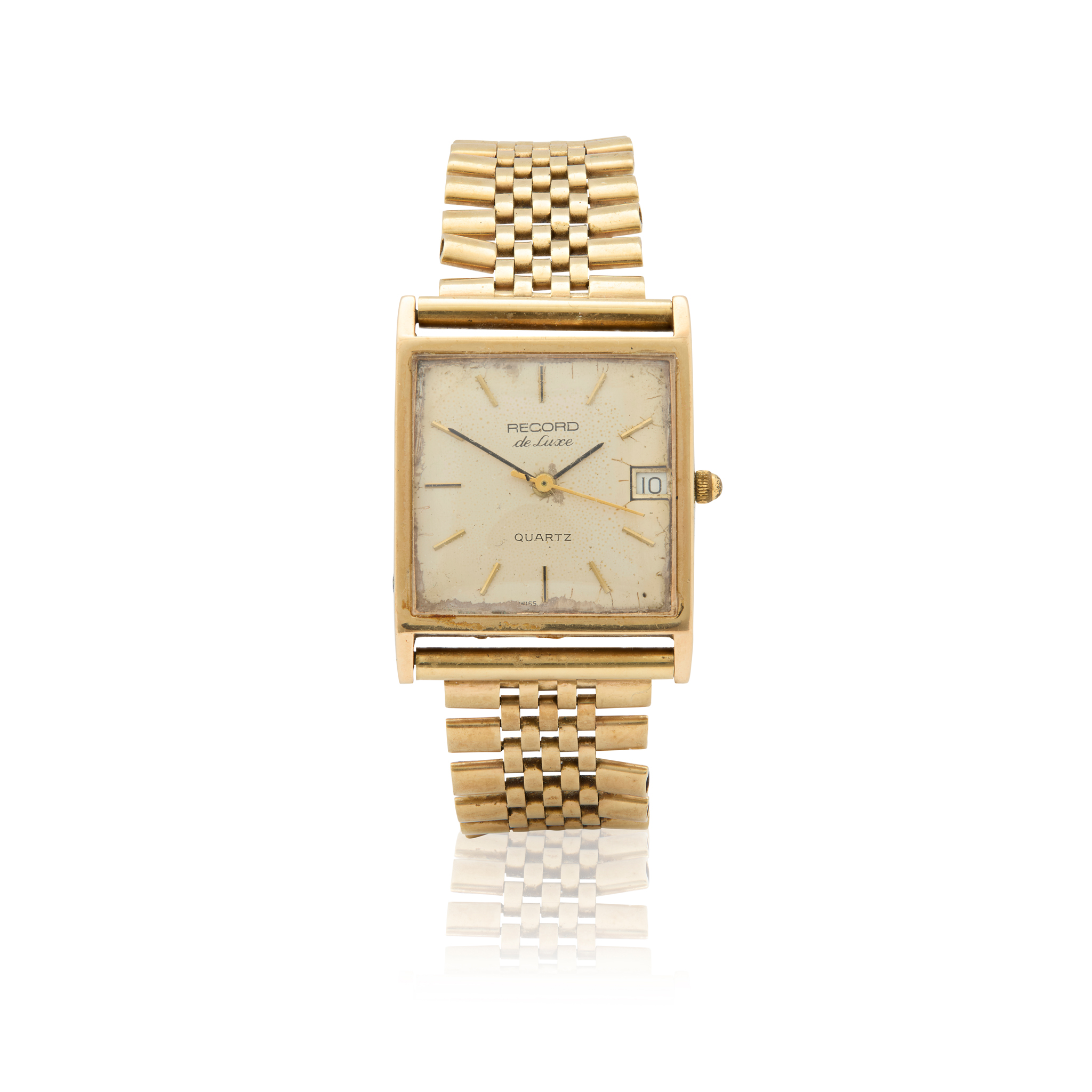 Record. A square 9k gold quartz wristwatch on associated 9k gold bracelet