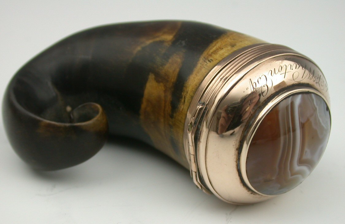 An early 19th century gold mounted ram's horn snuff mull,