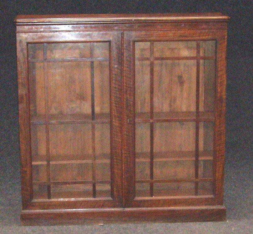 A pair of glazed rosewood Holland bookcases,