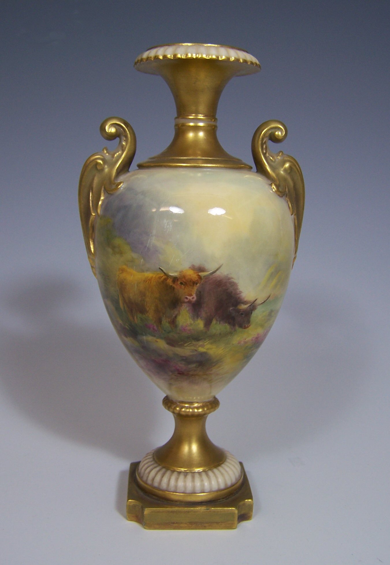 A small Royal Worcester baluster vase, By H Stinton