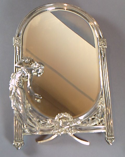 A WMF electroplated strut mirror