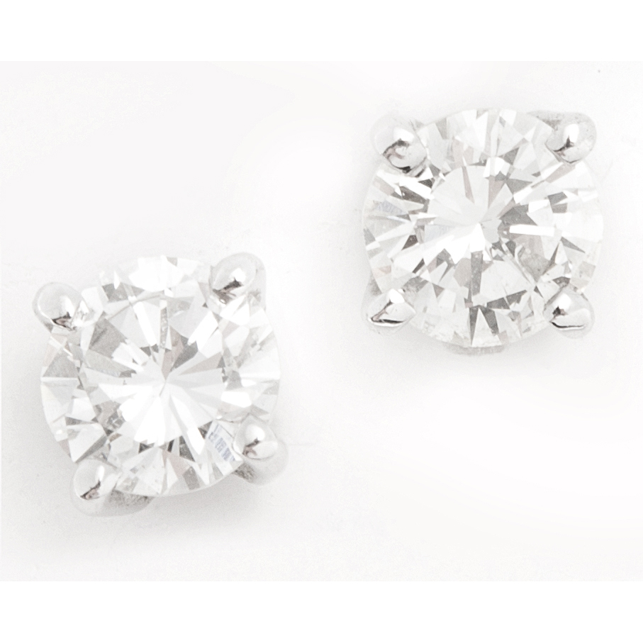A pair of diamond set earrings