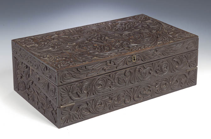 An early 19th century coromandel travelling writing box,