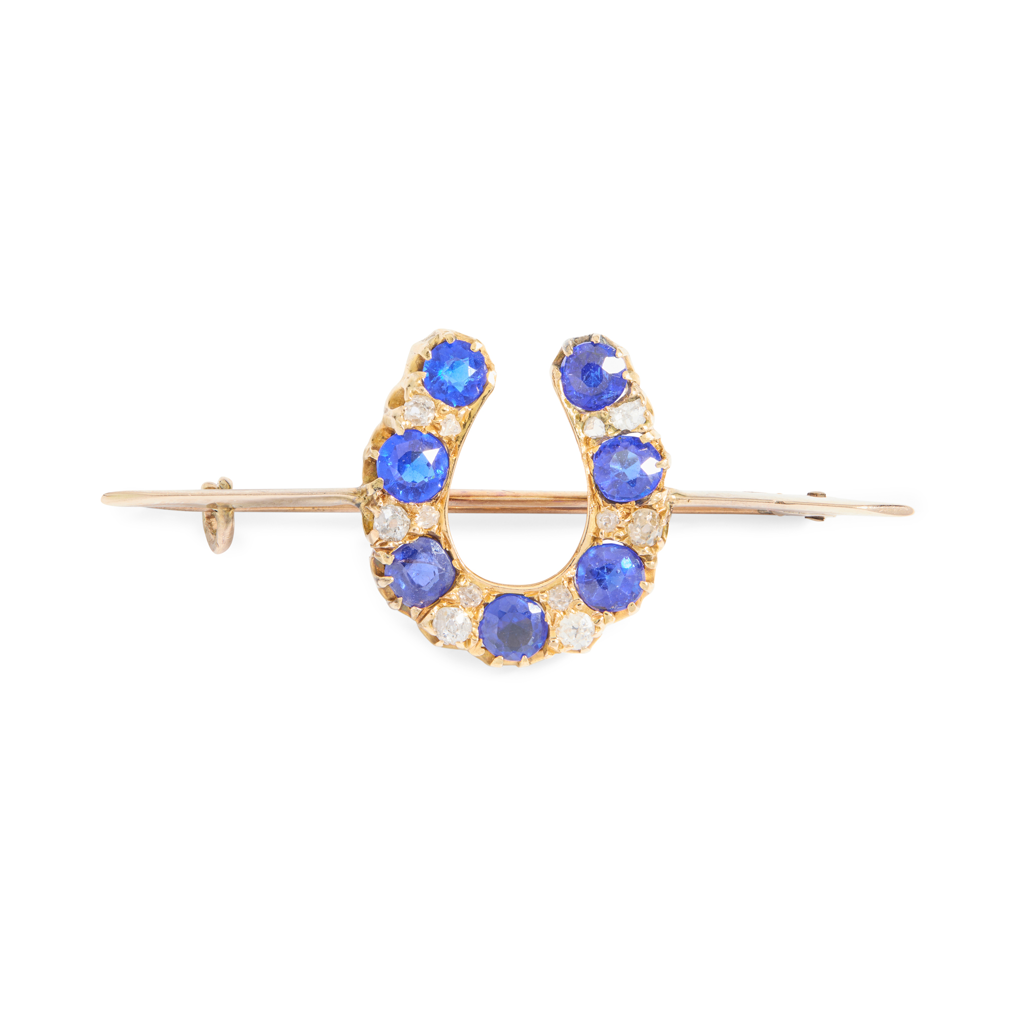 A diamond and blue-gem horse-shoe brooch