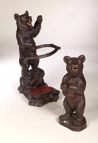 A 19th century Black Forest oak standing figure of a bear,