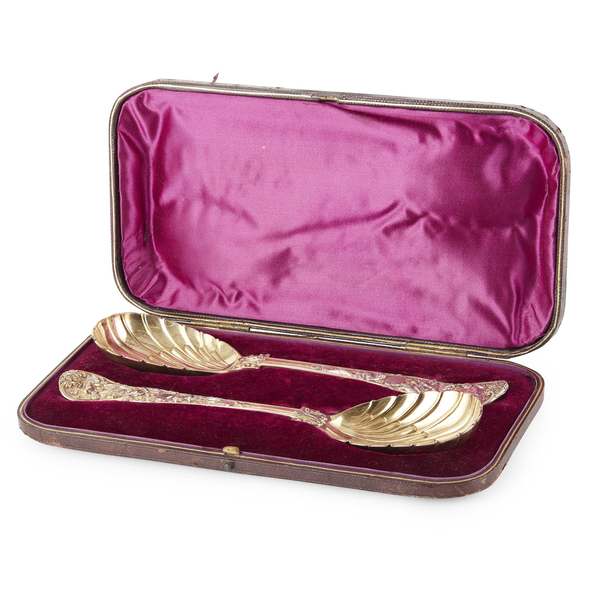 A CASED SET OF VICTORIAN SILVER-GILT BERRY SPOONS