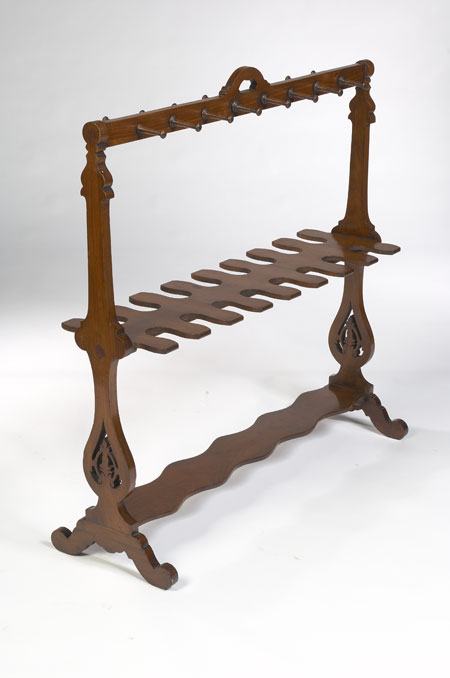 A Victorian period walnut riding boot rack