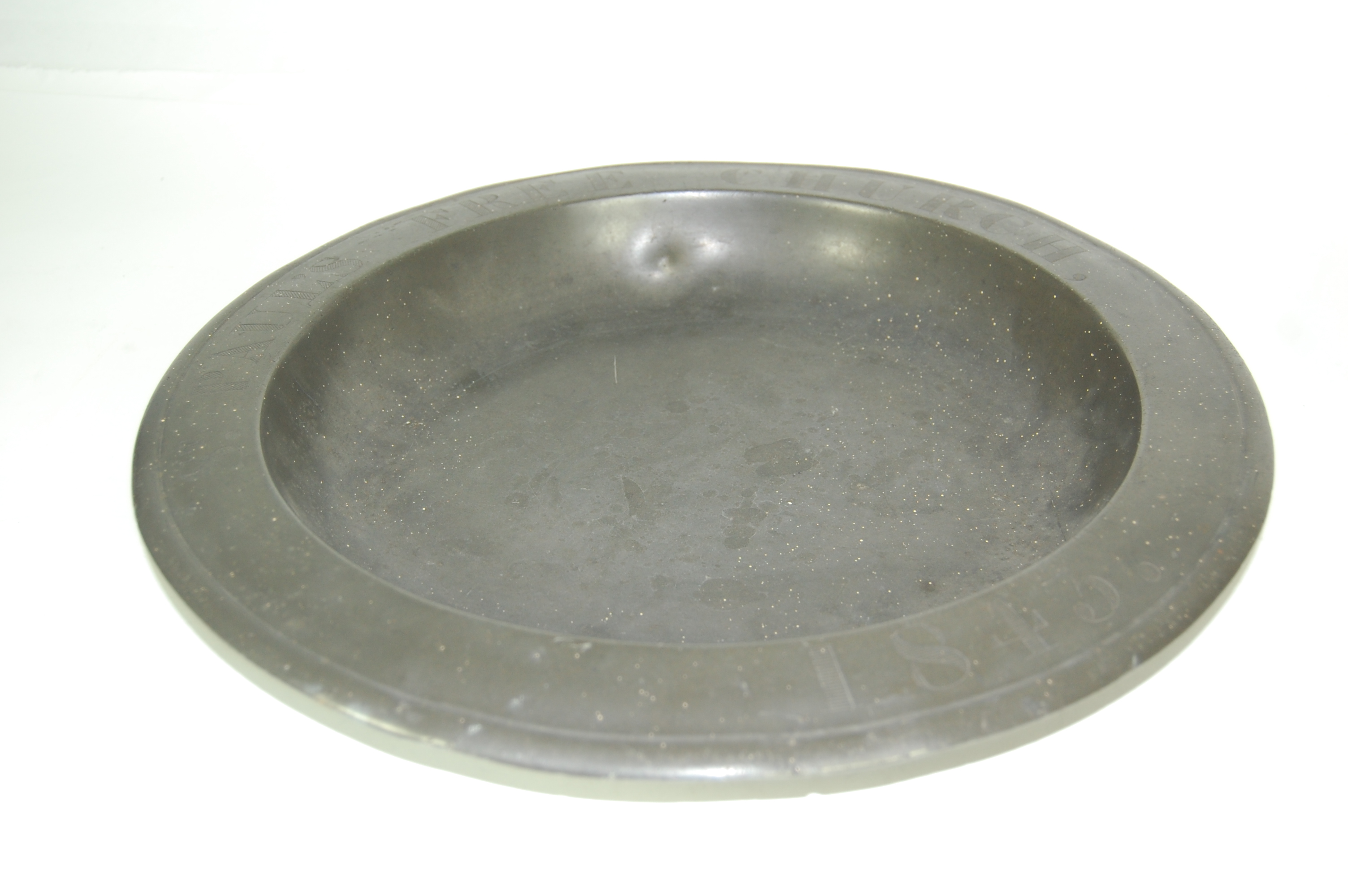 A 19th century pewter baptismal bowl