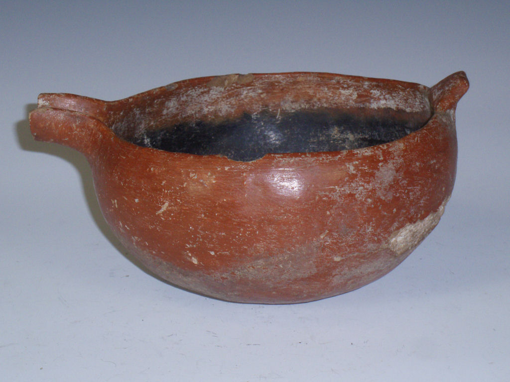A Bronze Age Cypriot Red Polished ware pottery bowl, c.2000 B.C.