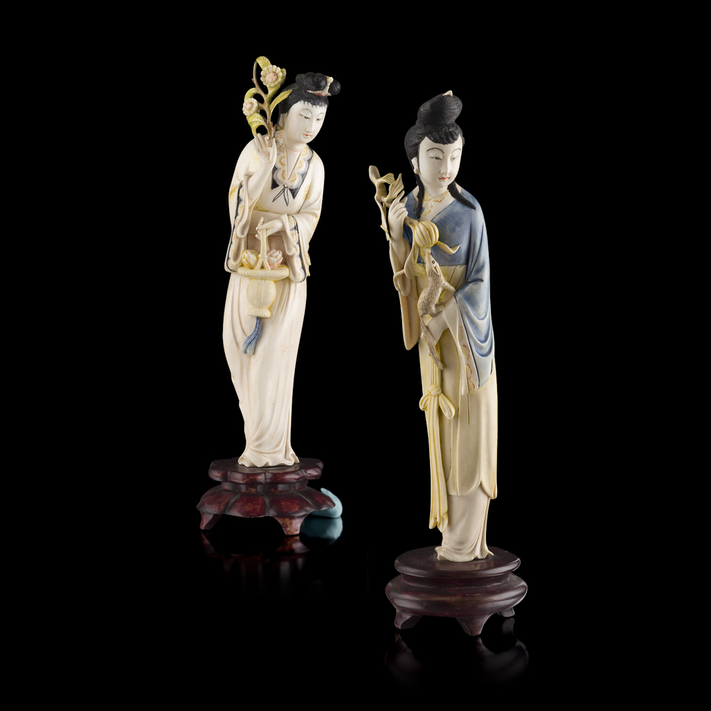 TWO PAINTED IVORY FIGURES OF FEMALE IMMORTALS