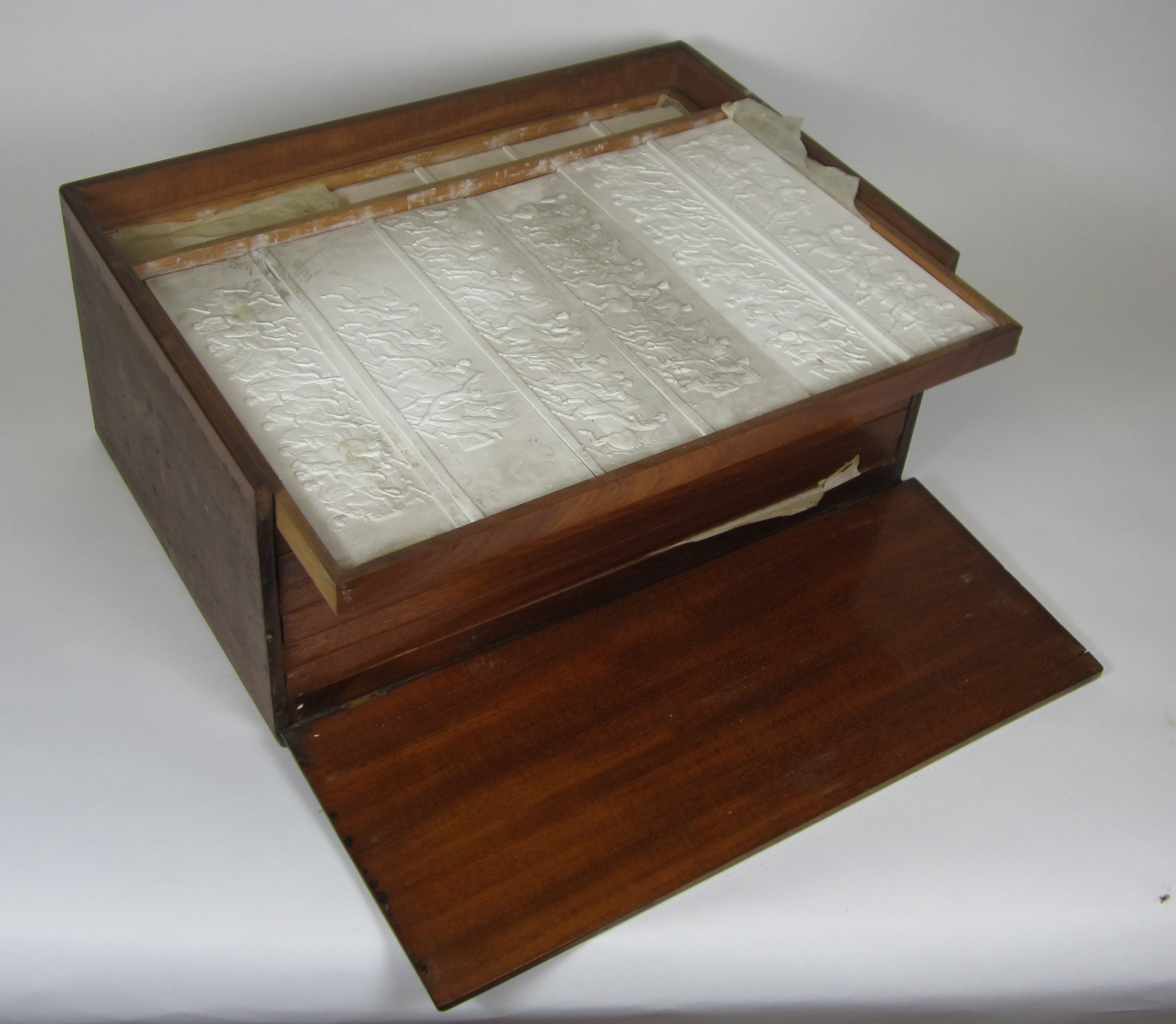CASED SET OF PLASTER RELIEFS OF THE PARTHENON FRIEZE