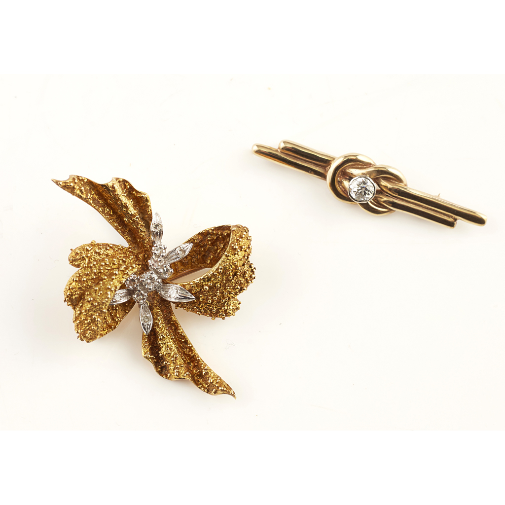 A 1970s 18ct gold and diamond set brooch