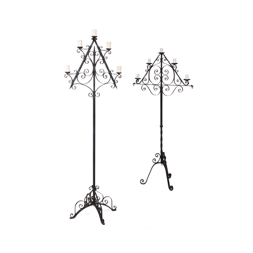 TWO WROUGHT IRON STANDING CANDELABRA