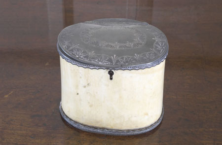 An 18th century pewter mounted ivory tea caddy