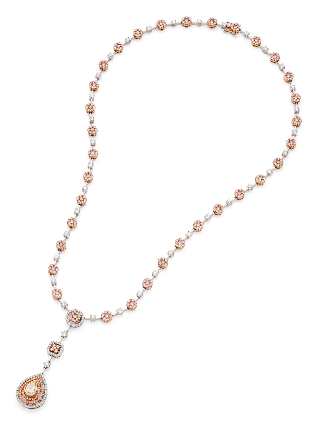 A contemporary three-coloured diamond set necklace