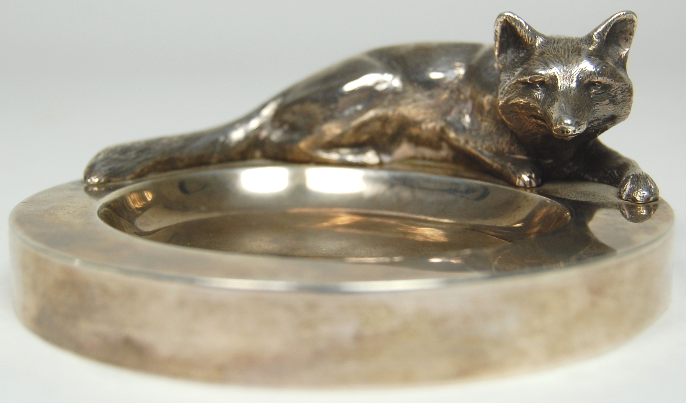 A modern novelty ashtray