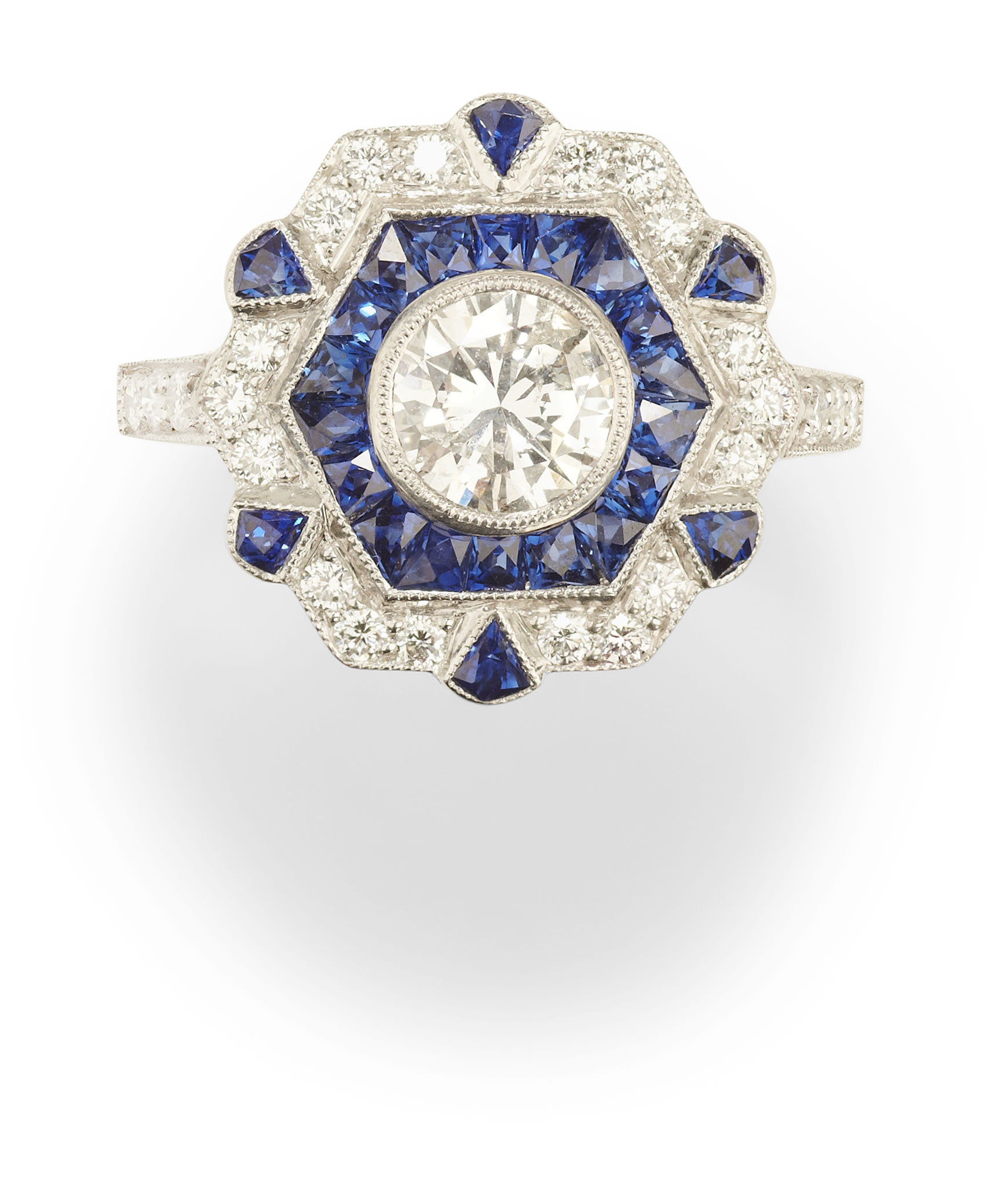 An Art Deco style sapphire and diamond cluster ring,