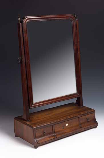 A George III mahogany toilet mirror