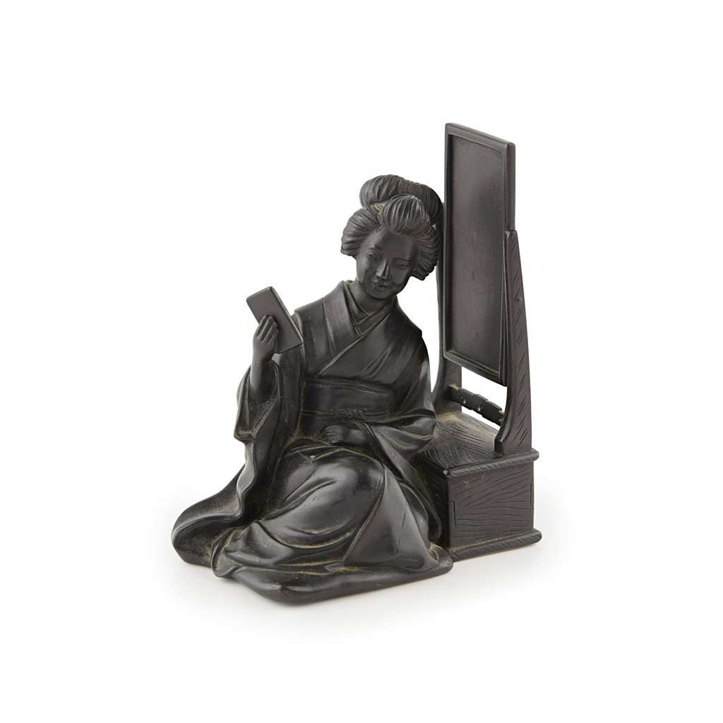 BRONZE FIGURE OF A GEISHA BESIDE A MIRROR